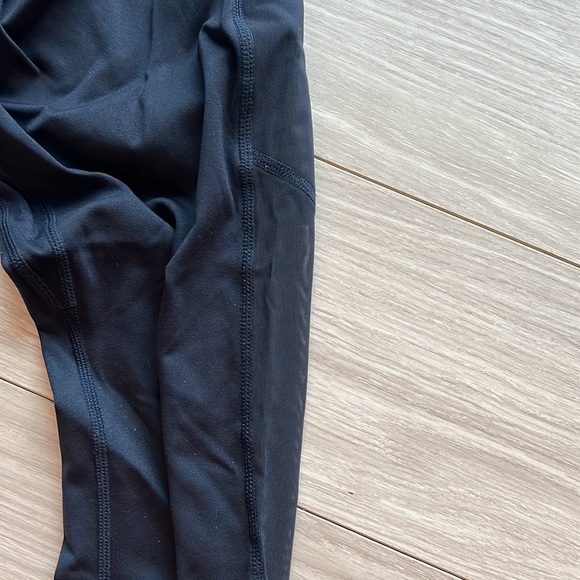 Fabletics xs navy blue leggings. Sheer side with side pockets - Picture 2 of 4